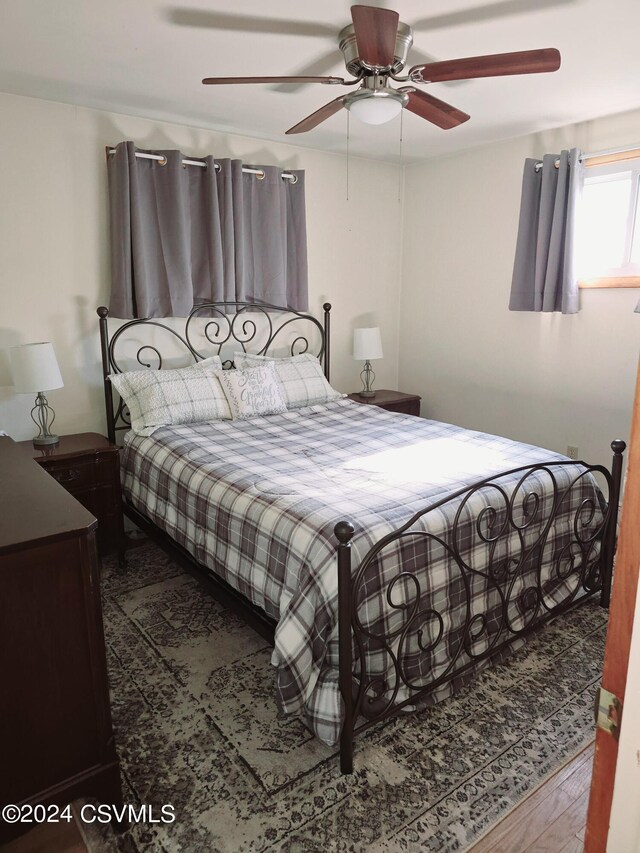 1000 E 6th St, Berwick, PA 18603 - bedroom with a ceiling fan and wood finished floors