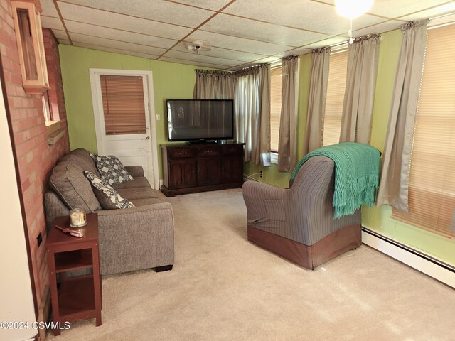 1000 E 6th St, Berwick, PA 18603 - carpeted living room with a drop ceiling and a baseboard radiator