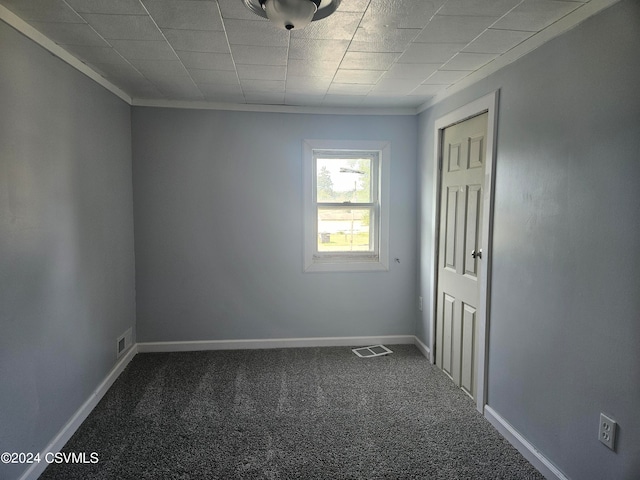 empty room featuring carpet flooring