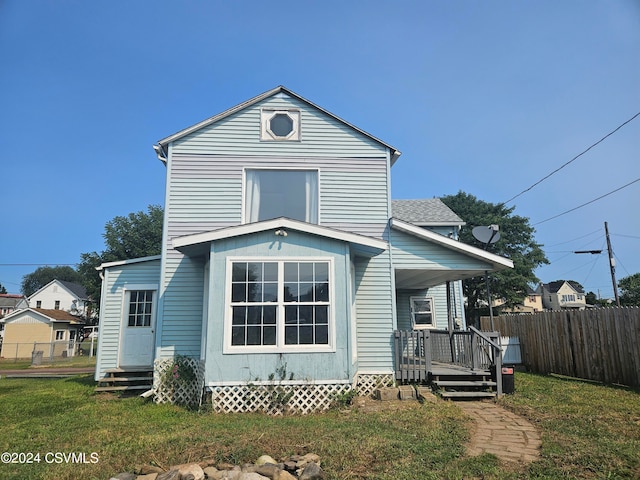 view of front of home with a front yard