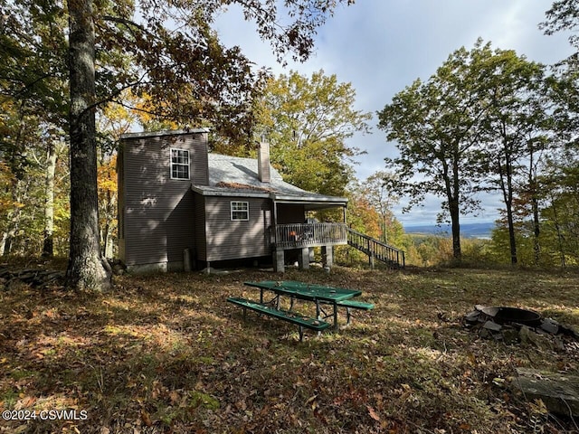 Simonds Hill Ln, Tioga, PA 16946 - exterior space with a wooden deck, a chimney, and stairway