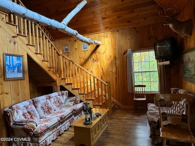 living room with wood walls, dark hardwood / wood-style floors, and wooden ceiling