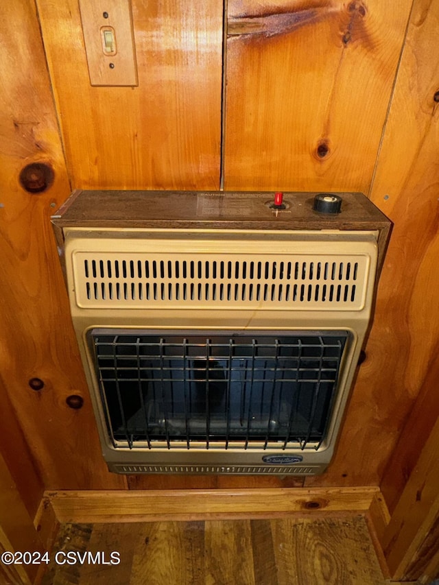 Simonds Hill Ln, Tioga, PA 16946 - room details featuring heating unit and wooden walls