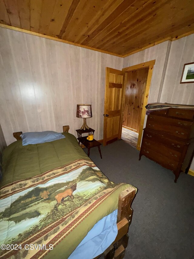 Simonds Hill Ln, Tioga, PA 16946 - carpeted bedroom featuring wooden ceiling and wooden walls