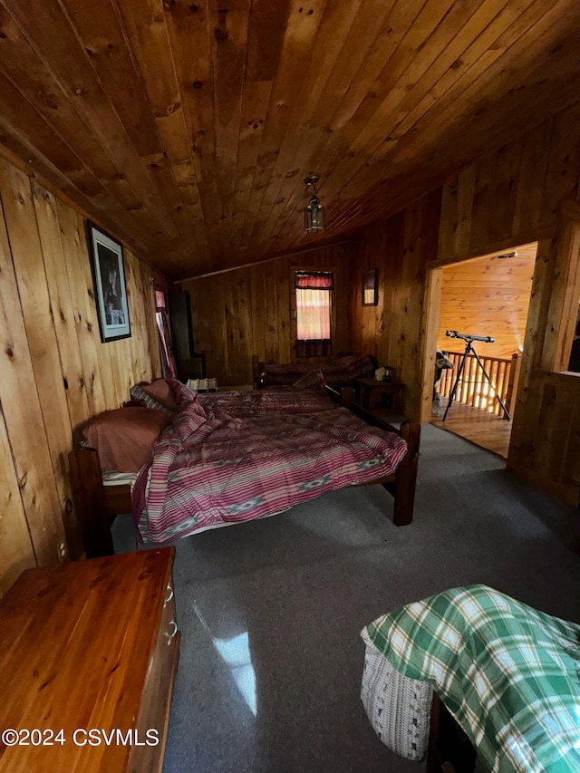 bedroom featuring wood ceiling and wooden walls