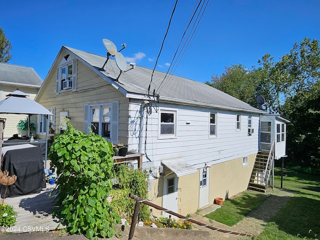 view of home's exterior with a gazebo