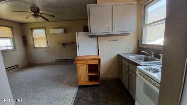 kitchen with a baseboard heating unit, sink, an AC wall unit, white appliances, and ceiling fan