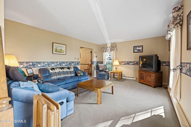 carpeted living room with a baseboard heating unit