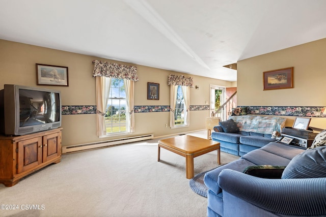 living room featuring a baseboard heating unit and light colored carpet