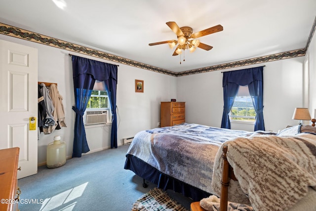 carpeted bedroom featuring a baseboard radiator, cooling unit, and ceiling fan