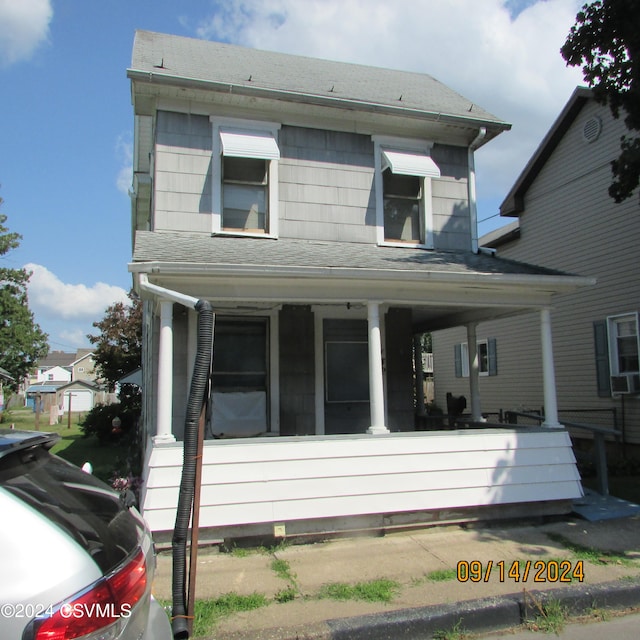 view of front of home featuring covered porch