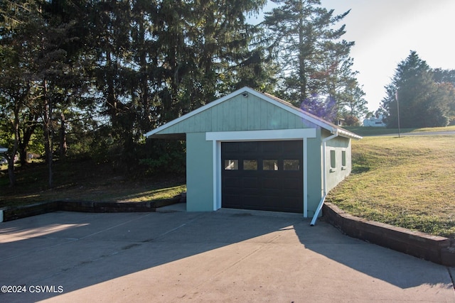 garage with a yard