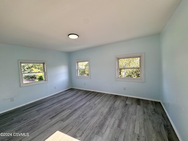 112 Green St, Edwardsville, PA 18704 - unfurnished room featuring dark wood finished floors and baseboards