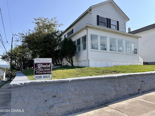 112 Green St, Edwardsville, PA 18704 - view of front of home with a front lawn