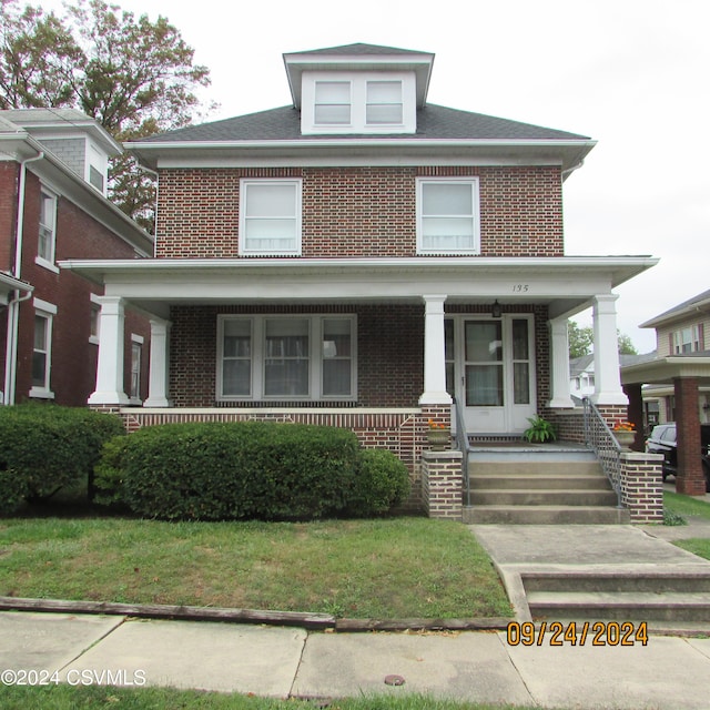 view of front of home featuring covered porch