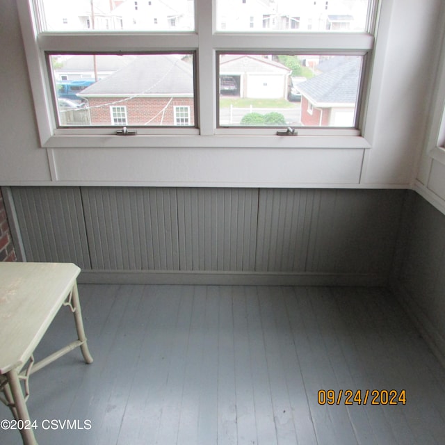 unfurnished sunroom featuring a healthy amount of sunlight