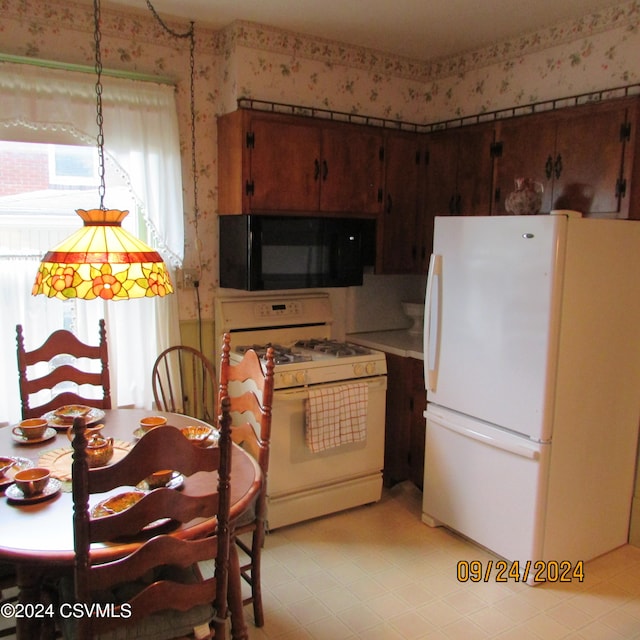 kitchen featuring white appliances