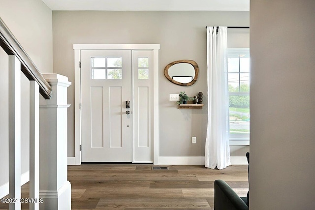 entrance foyer with hardwood / wood-style flooring