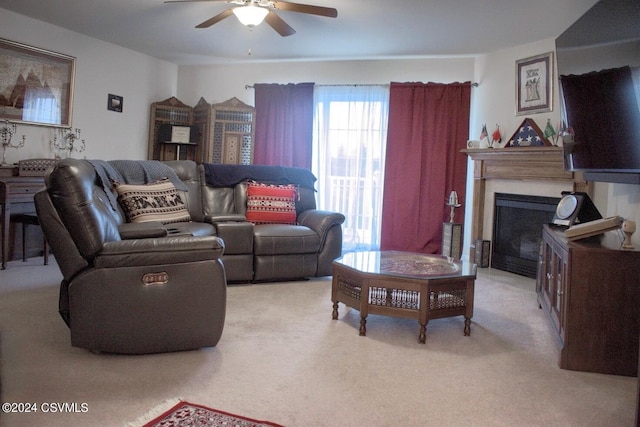 living room featuring ceiling fan and light colored carpet