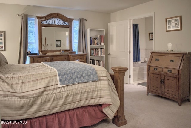 bedroom featuring light carpet