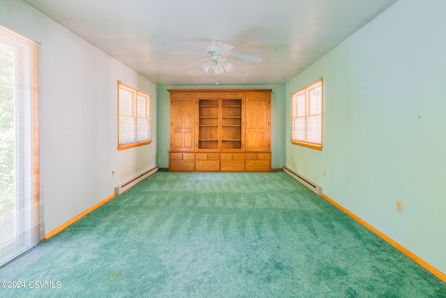 unfurnished bedroom featuring light carpet, a baseboard heating unit, and ceiling fan