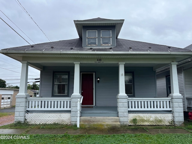 bungalow-style home featuring covered porch