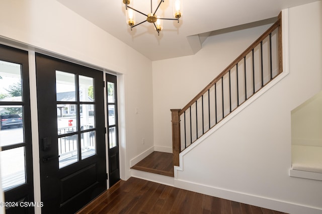 foyer entrance with dark hardwood / wood-style flooring