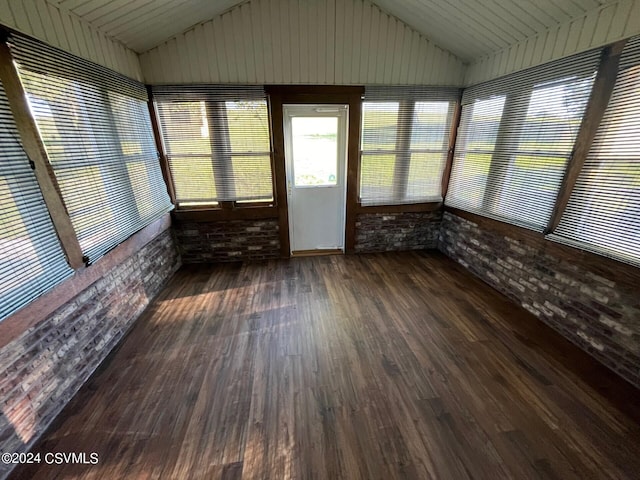 unfurnished sunroom with wood ceiling and vaulted ceiling