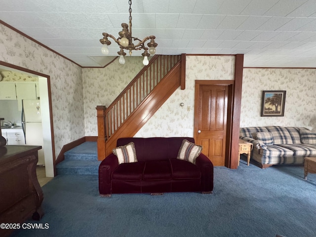 1442 Hemlock St, Coal Township, PA 17866 - carpeted living area with wallpapered walls, a chandelier, stairs, and crown molding