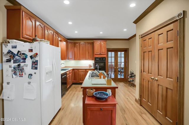 kitchen featuring white fridge with ice dispenser, dishwasher, a kitchen island with sink, crown molding, and french doors