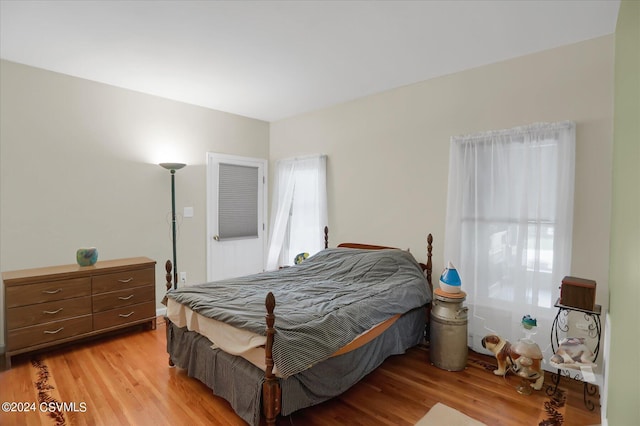 bedroom with light wood-style floors