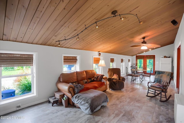 living room with french doors, track lighting, lofted ceiling, and wood ceiling