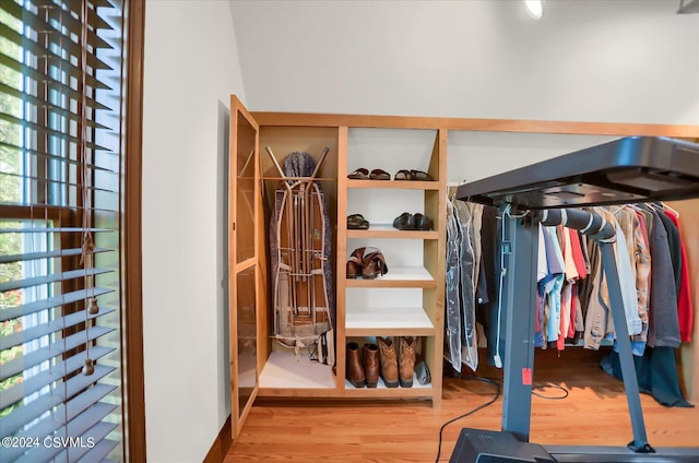 spacious closet featuring wood finished floors