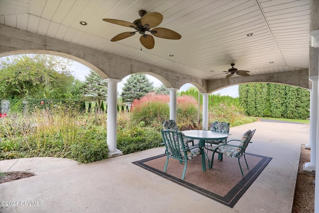 view of patio with ceiling fan and outdoor dining area