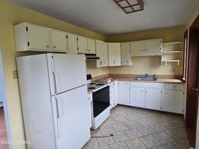 kitchen with white cabinetry, sink, and white appliances