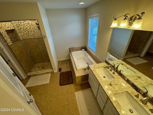 bathroom with vanity, shower with separate bathtub, and tile patterned floors