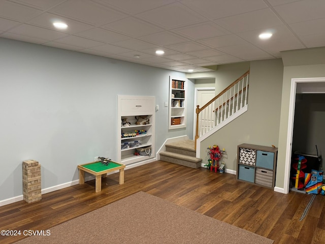 recreation room featuring dark hardwood / wood-style floors