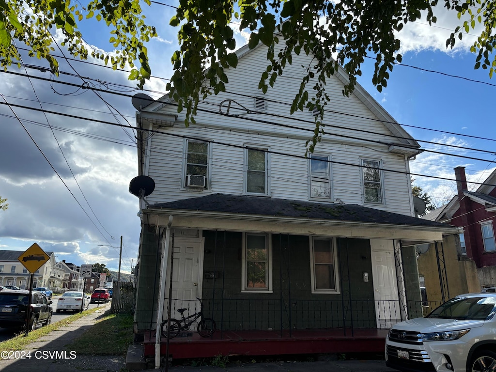 view of property with a porch