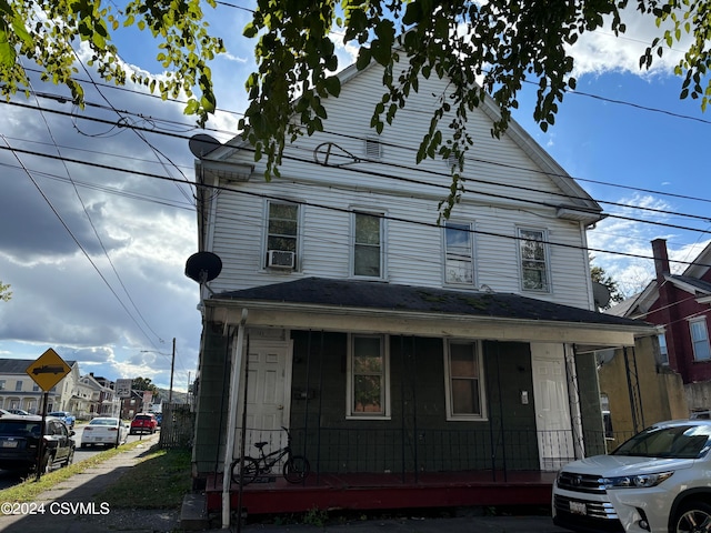 view of property with a porch