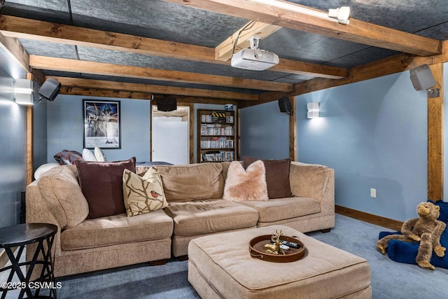 carpeted living room featuring beam ceiling and baseboards