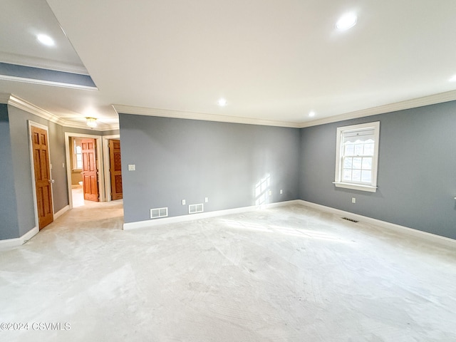 carpeted empty room with ornamental molding