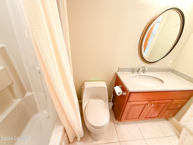 full bathroom with toilet, vanity, shower / bath combination with curtain, and tile patterned floors