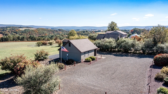 drone / aerial view featuring a mountain view