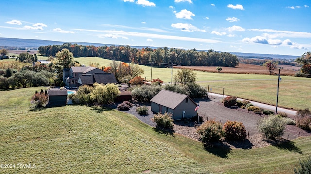 birds eye view of property featuring a rural view