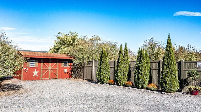 exterior space with a storage unit