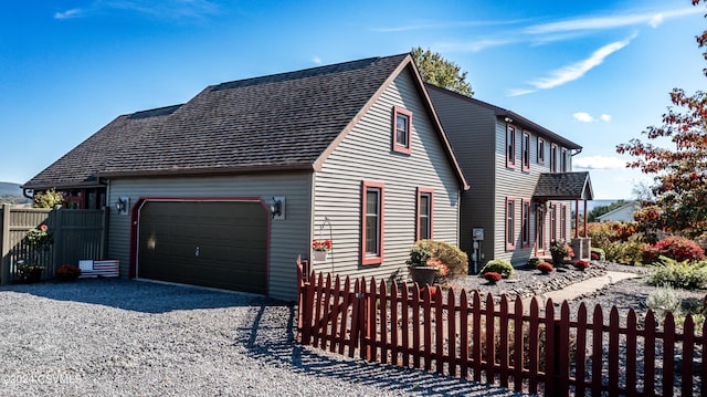 view of home's exterior with a garage