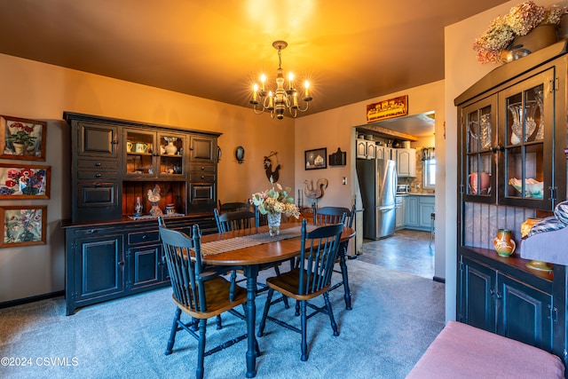 dining area featuring a chandelier