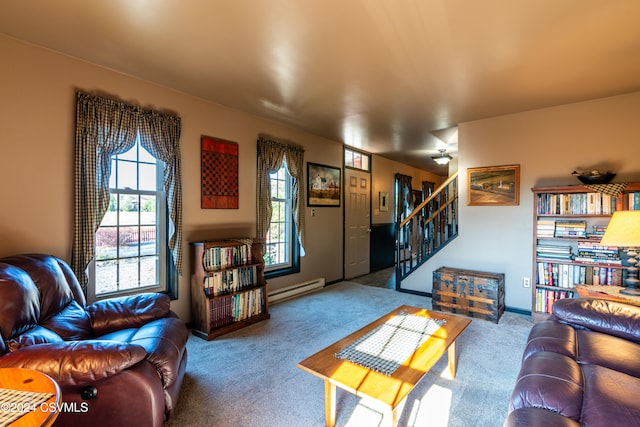 living room featuring carpet and a baseboard heating unit