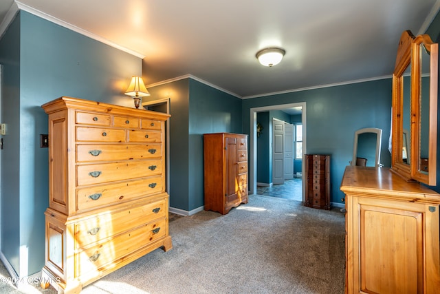 bedroom with ornamental molding and carpet