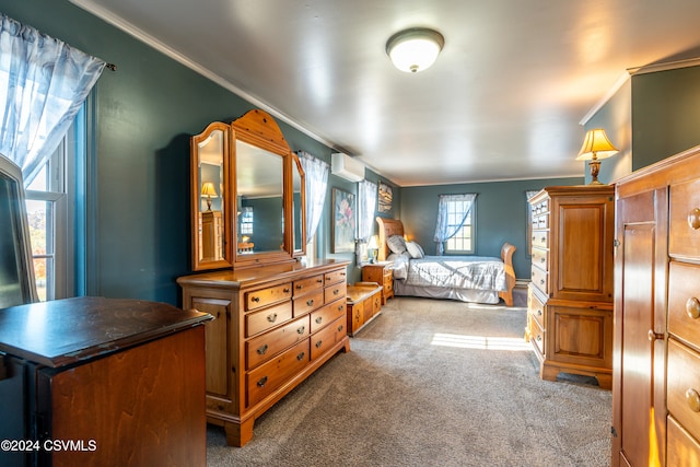 bedroom featuring a wall mounted air conditioner, crown molding, and carpet